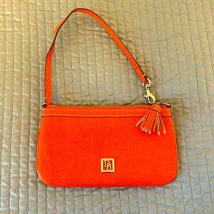 Orange Dooney and Burke clutch/wristlet
